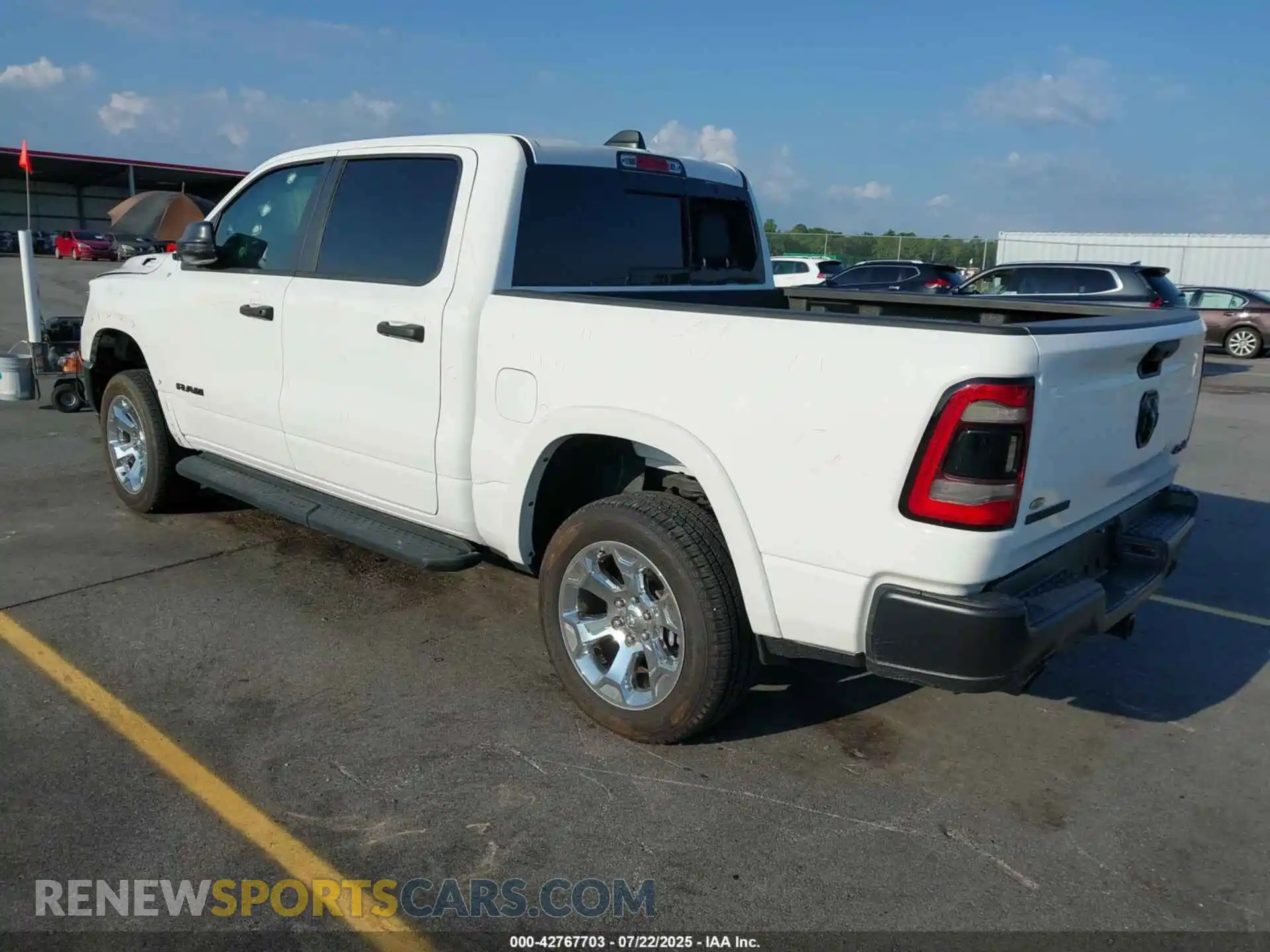3 Photograph of a damaged car 1C6SRFFT2PN575076 RAM 1500 2023