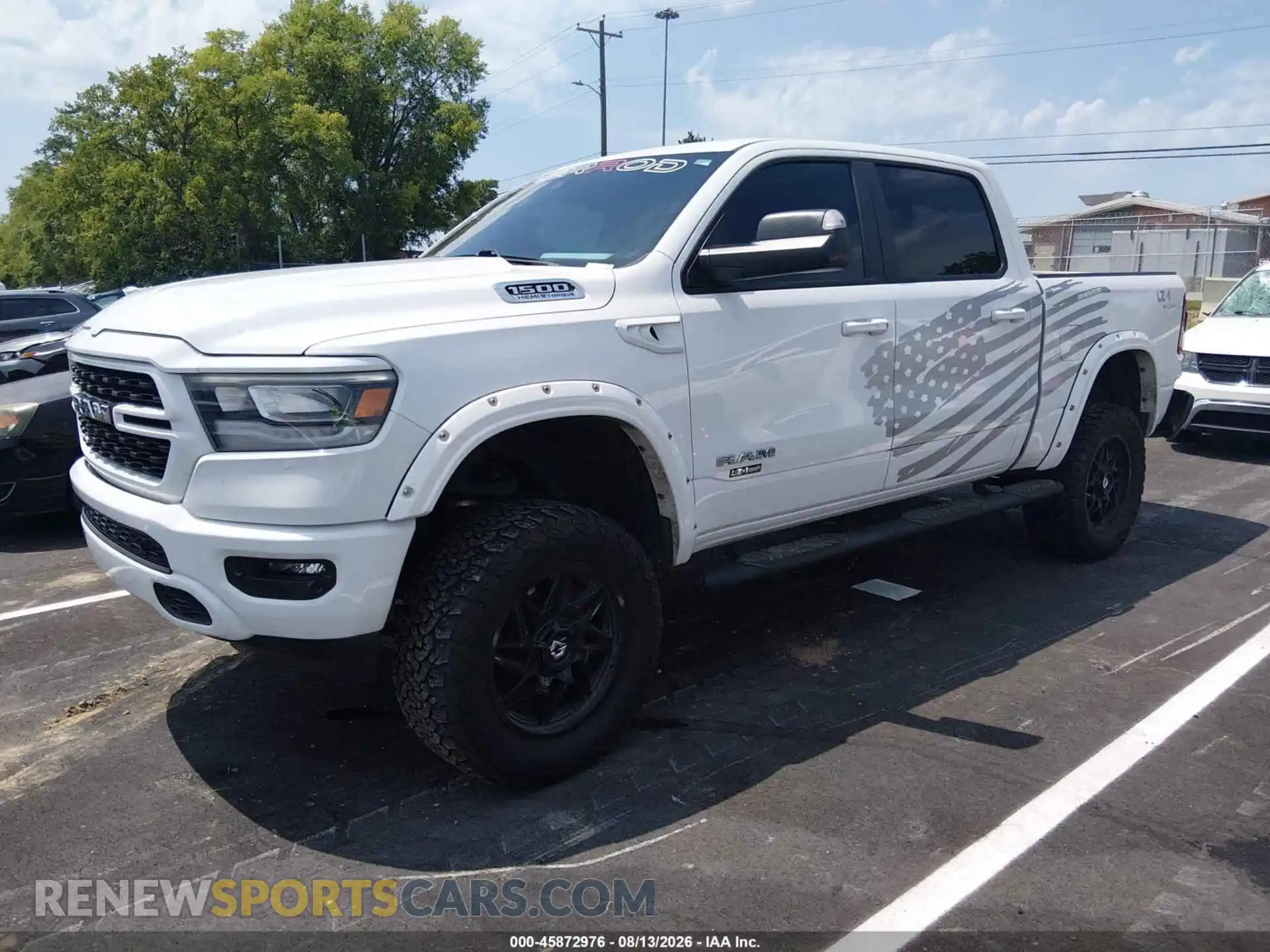 2 Photograph of a damaged car 1C6SRFFT2PN602390 RAM 1500 2023