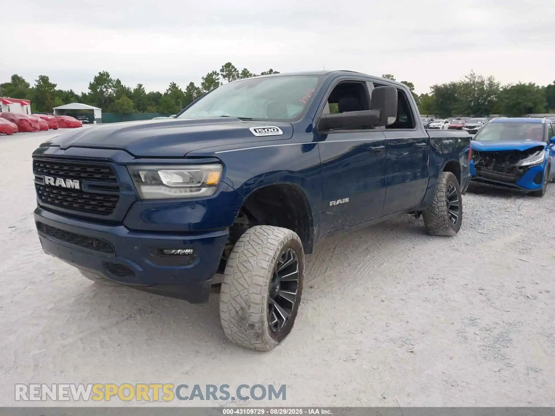 2 Photograph of a damaged car 1C6SRFFT2PN653002 RAM 1500 2023