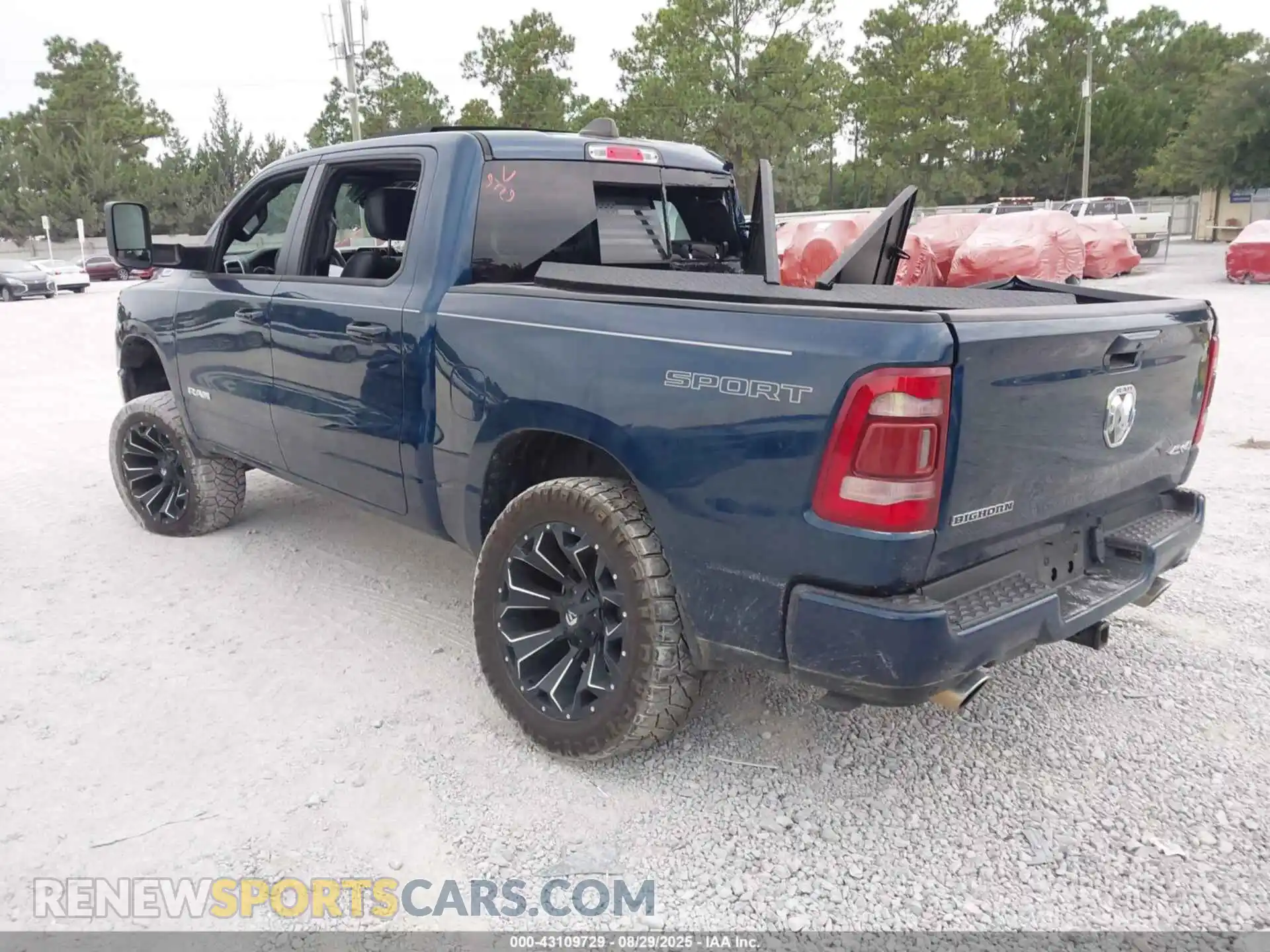 3 Photograph of a damaged car 1C6SRFFT2PN653002 RAM 1500 2023