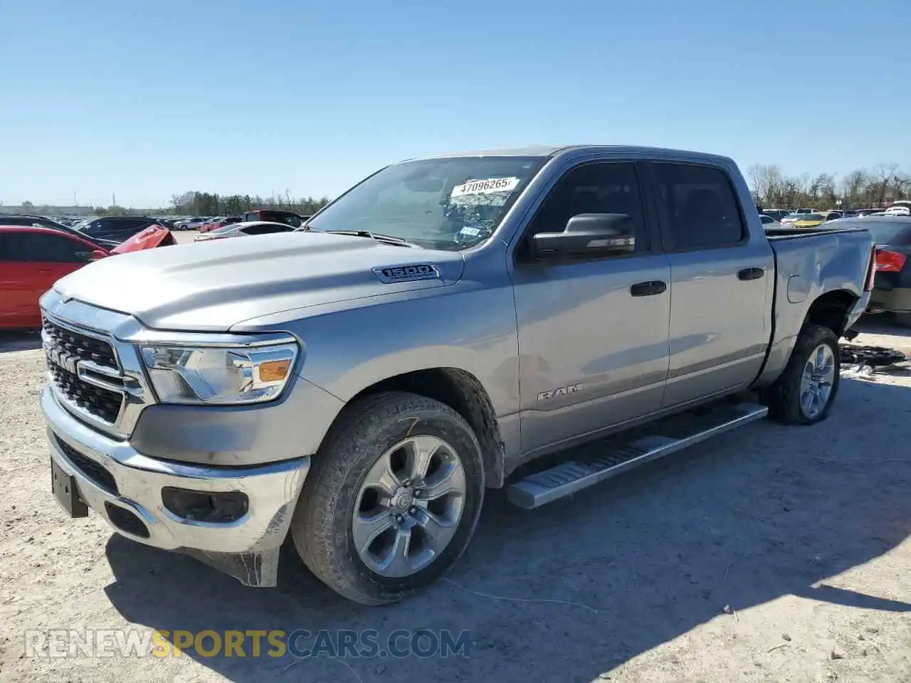 1 Photograph of a damaged car 1C6SRFFT2PN691636 RAM 1500 2023