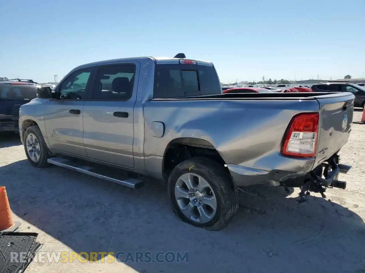 2 Photograph of a damaged car 1C6SRFFT2PN691636 RAM 1500 2023