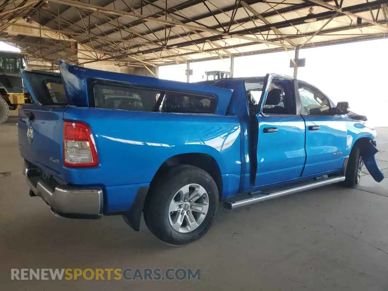 3 Photograph of a damaged car 1C6SRFFT2PN702733 RAM 1500 2023