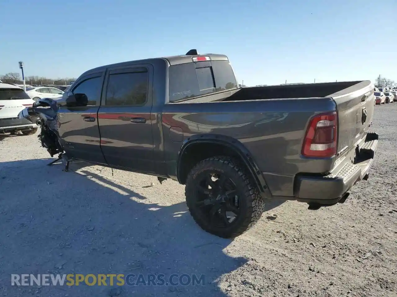 2 Photograph of a damaged car 1C6SRFFT3PN602382 RAM 1500 2023