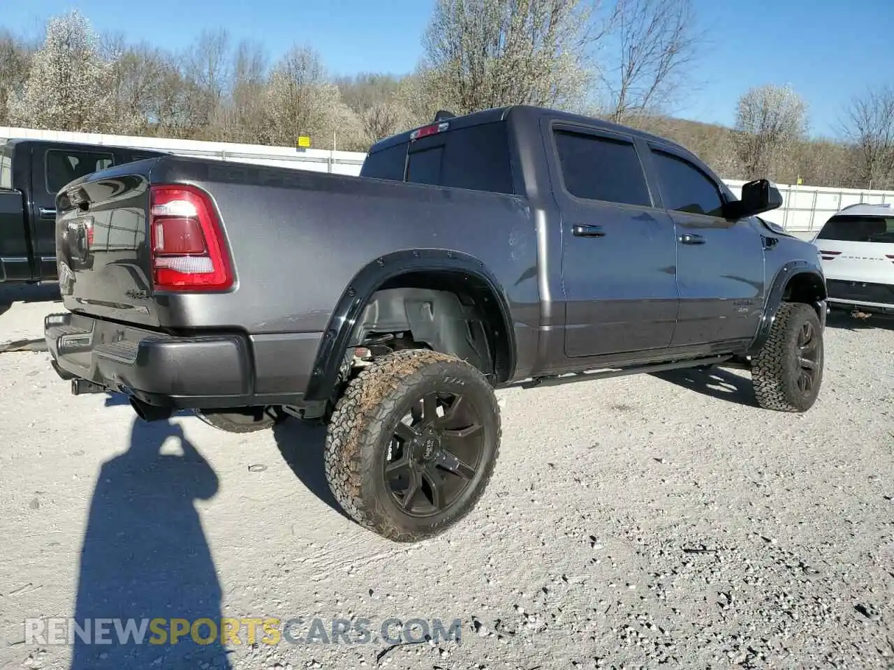 3 Photograph of a damaged car 1C6SRFFT3PN602382 RAM 1500 2023