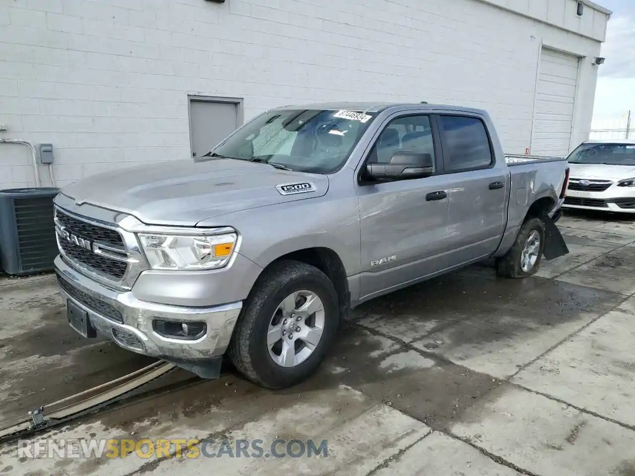 1 Photograph of a damaged car 1C6SRFFT4PN628327 RAM 1500 2023