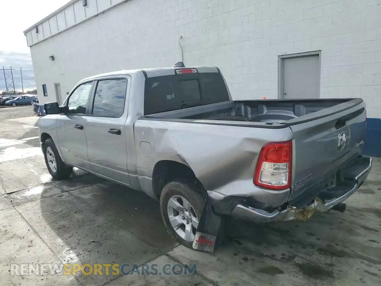 2 Photograph of a damaged car 1C6SRFFT4PN628327 RAM 1500 2023