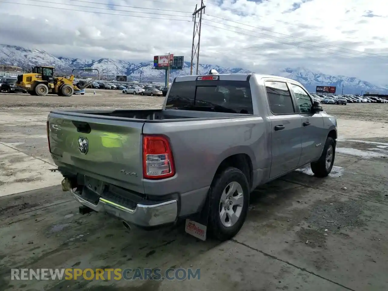 3 Photograph of a damaged car 1C6SRFFT4PN628327 RAM 1500 2023