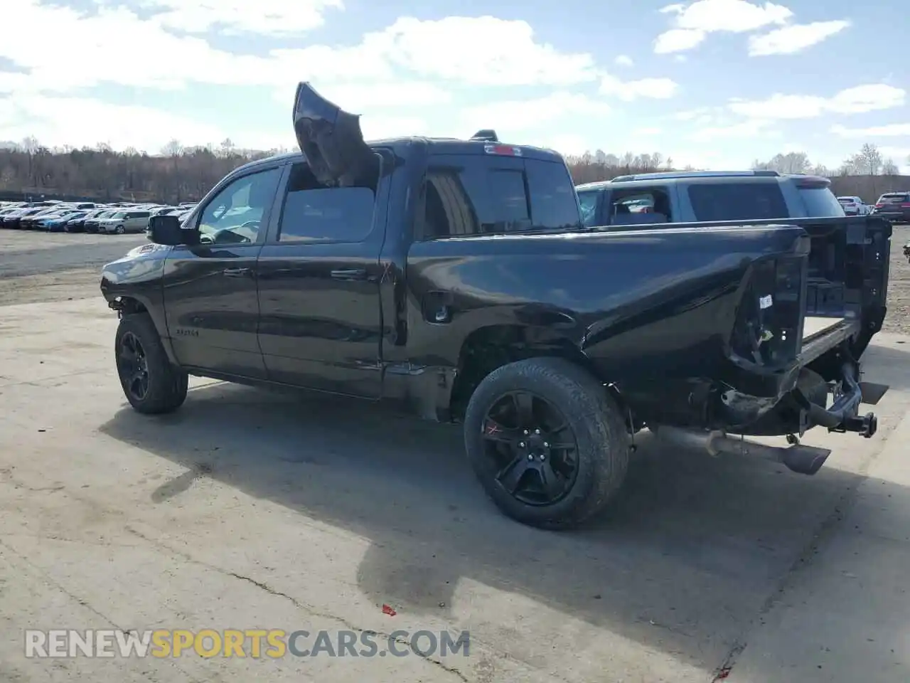 2 Photograph of a damaged car 1C6SRFFT4PN678323 RAM 1500 2023