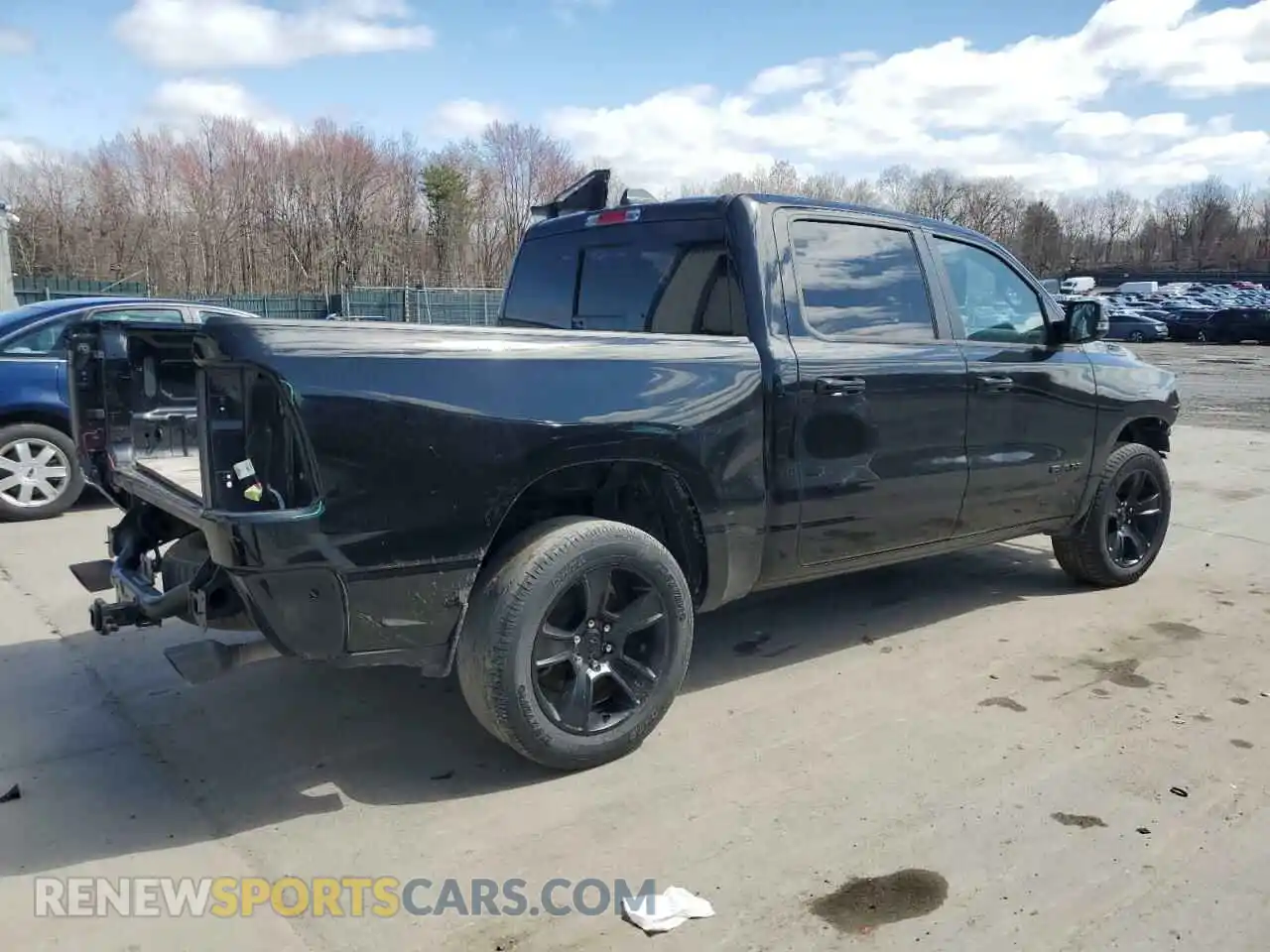 3 Photograph of a damaged car 1C6SRFFT4PN678323 RAM 1500 2023