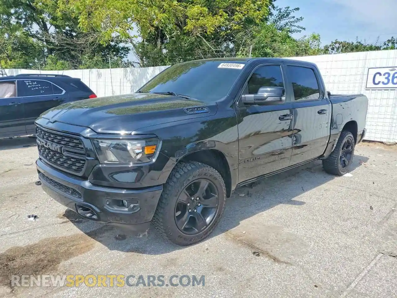 1 Photograph of a damaged car 1C6SRFFT4PN684056 RAM 1500 2023