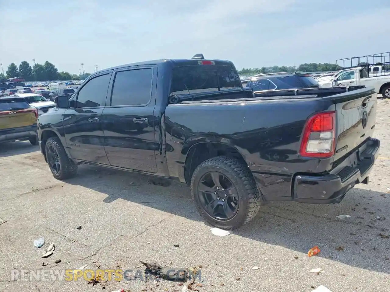 2 Photograph of a damaged car 1C6SRFFT4PN684056 RAM 1500 2023