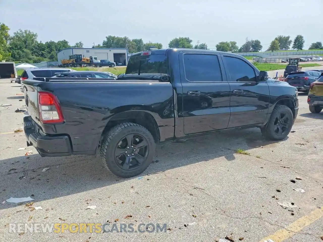 3 Photograph of a damaged car 1C6SRFFT4PN684056 RAM 1500 2023