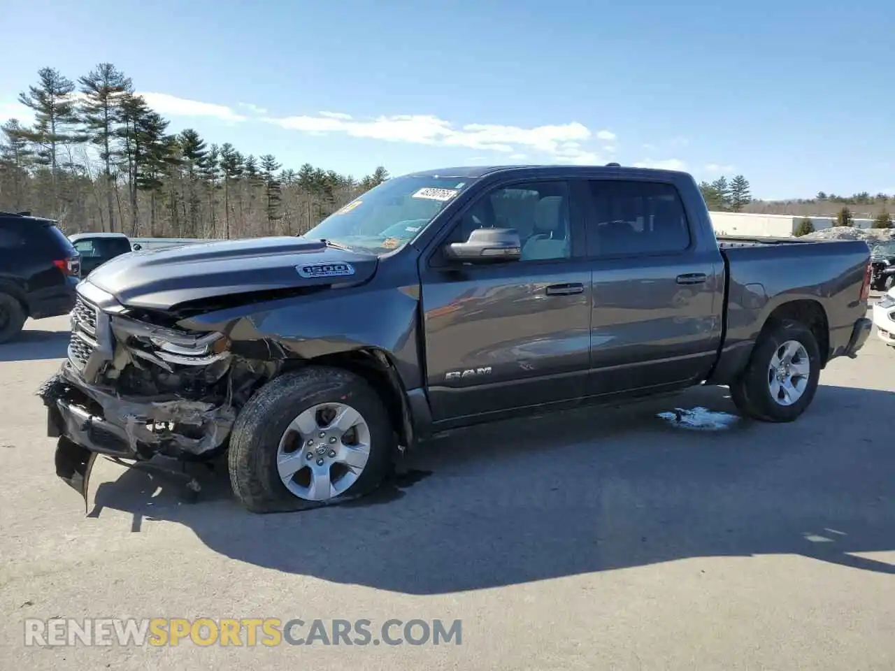 1 Photograph of a damaged car 1C6SRFFT5PN603131 RAM 1500 2023