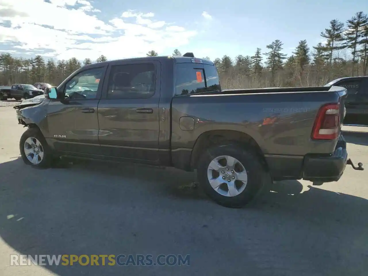 2 Photograph of a damaged car 1C6SRFFT5PN603131 RAM 1500 2023