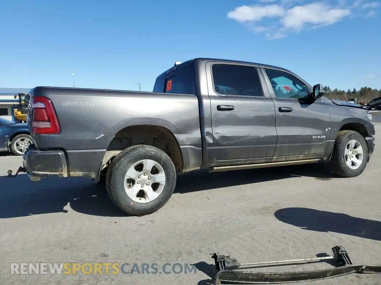 3 Photograph of a damaged car 1C6SRFFT5PN603131 RAM 1500 2023