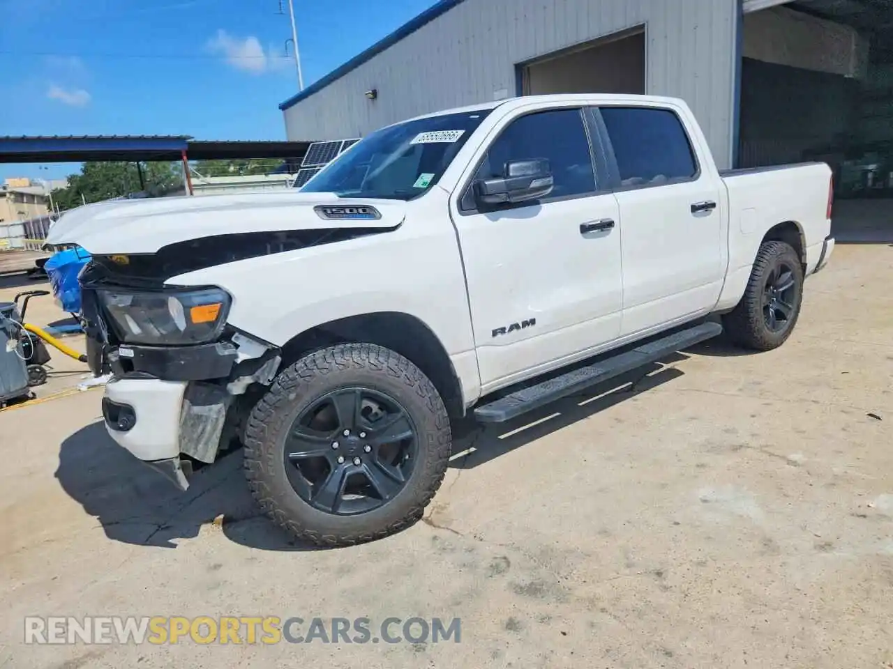 1 Photograph of a damaged car 1C6SRFFT5PN657383 RAM 1500 2023