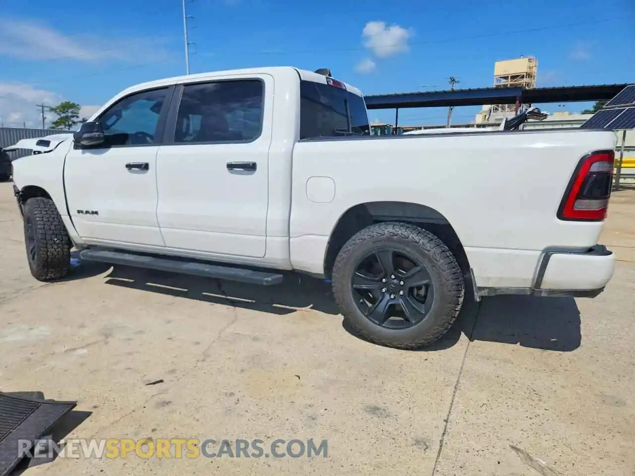 2 Photograph of a damaged car 1C6SRFFT5PN657383 RAM 1500 2023
