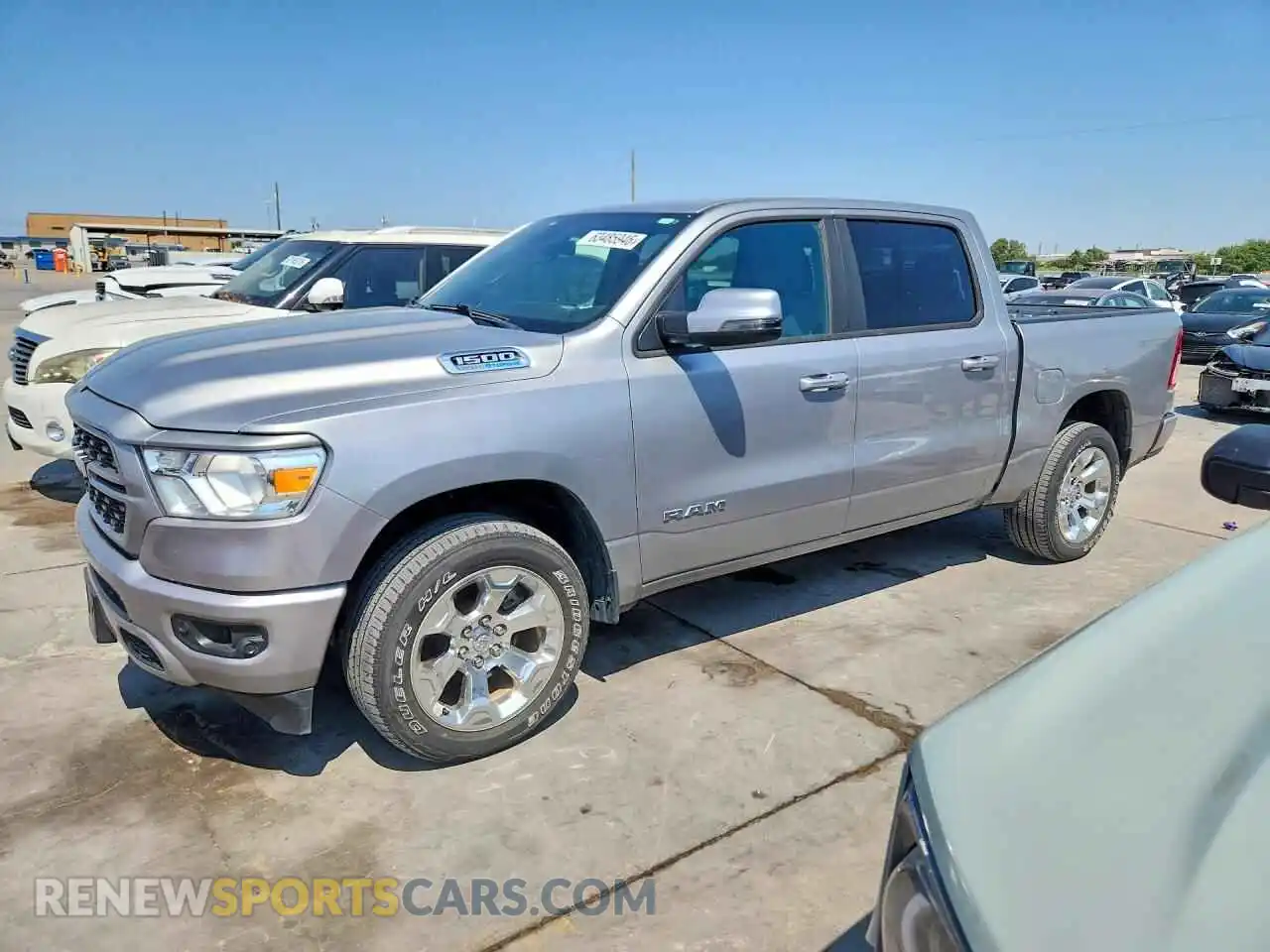 1 Photograph of a damaged car 1C6SRFFT5PN697351 RAM 1500 2023