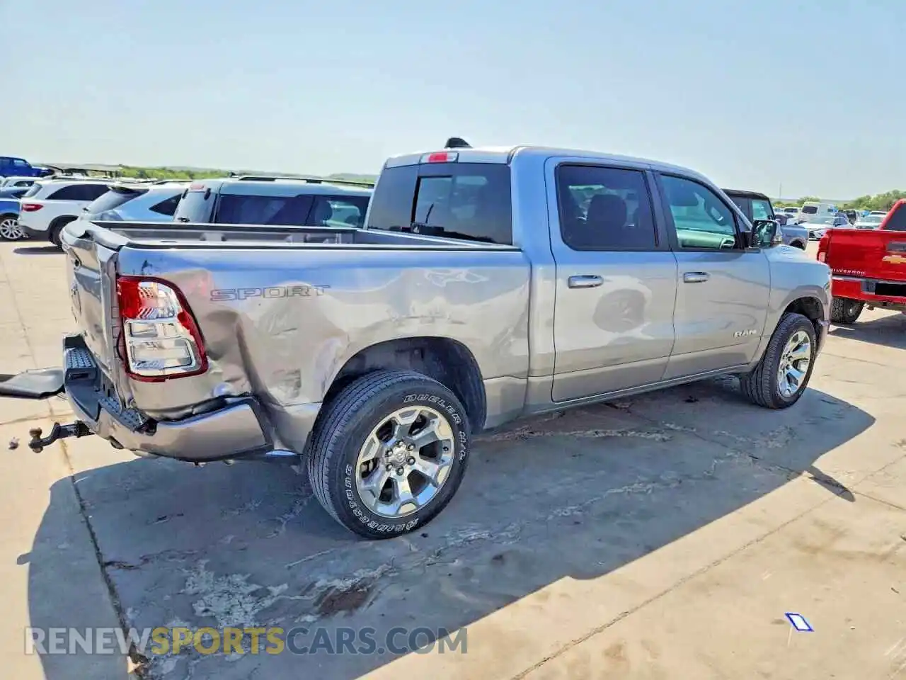 3 Photograph of a damaged car 1C6SRFFT5PN697351 RAM 1500 2023