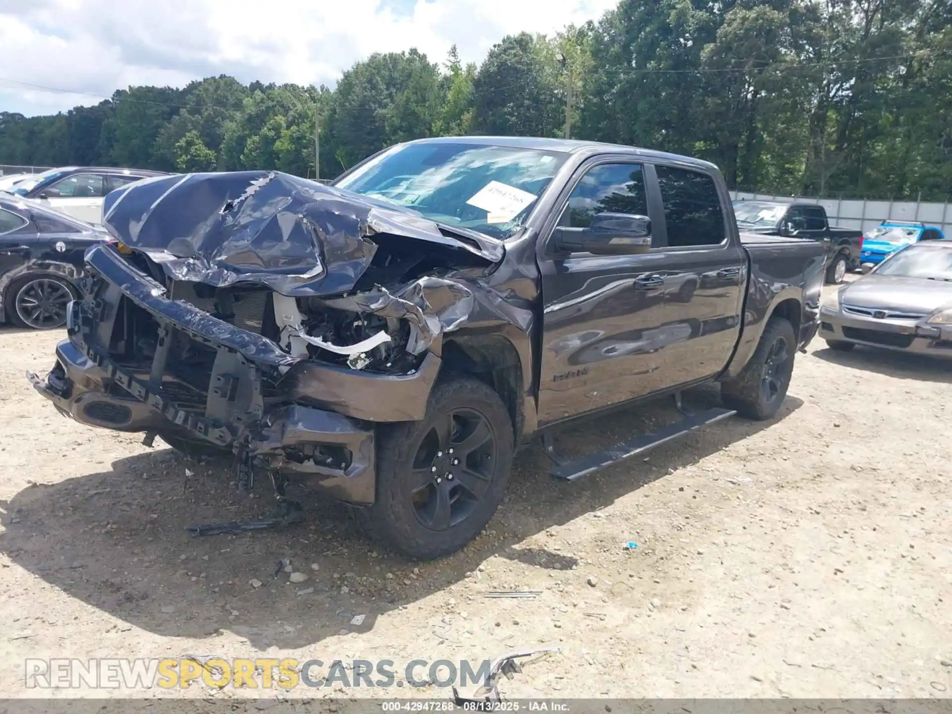 2 Photograph of a damaged car 1C6SRFFT6PN645923 RAM 1500 2023