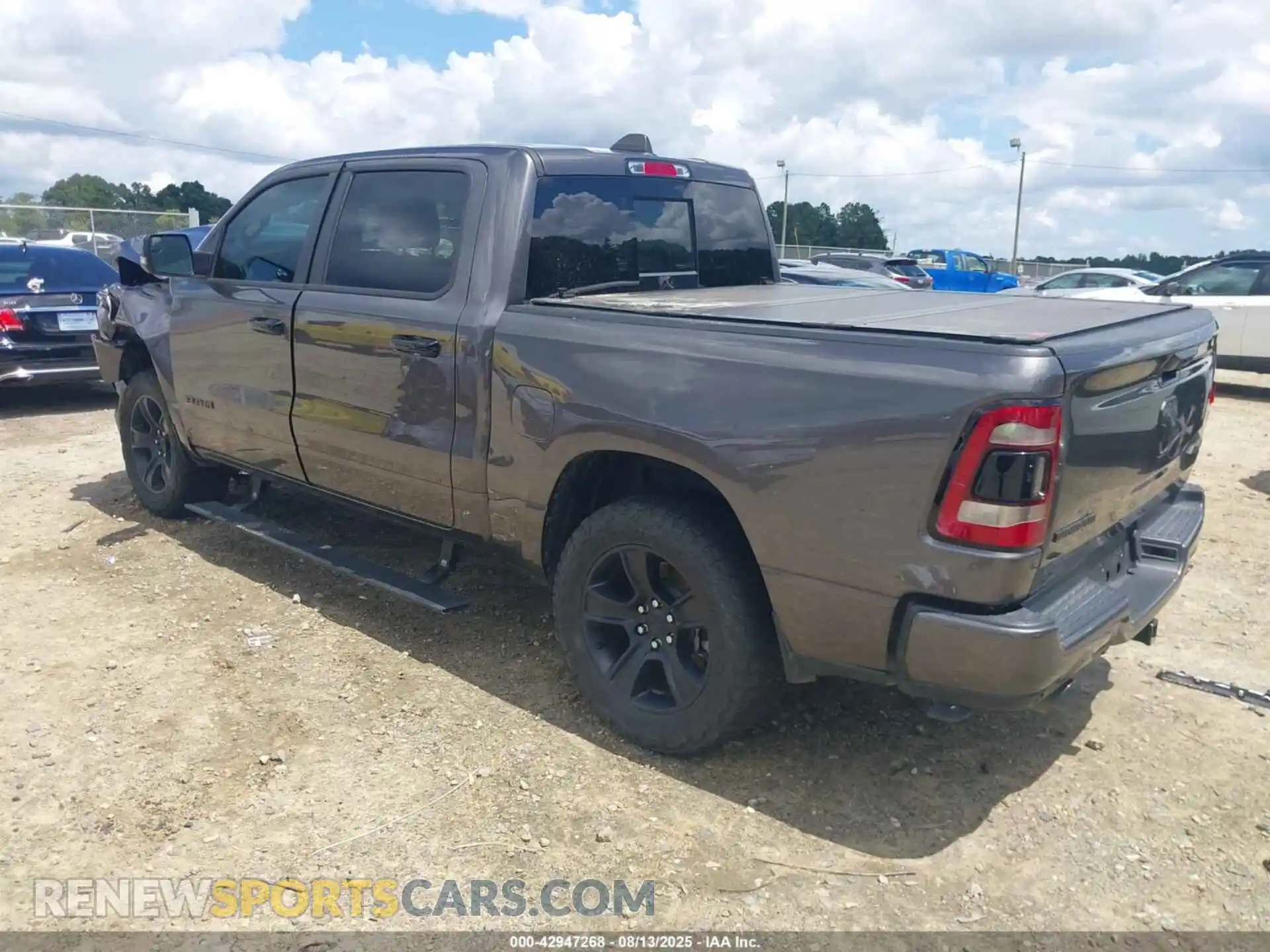 3 Photograph of a damaged car 1C6SRFFT6PN645923 RAM 1500 2023