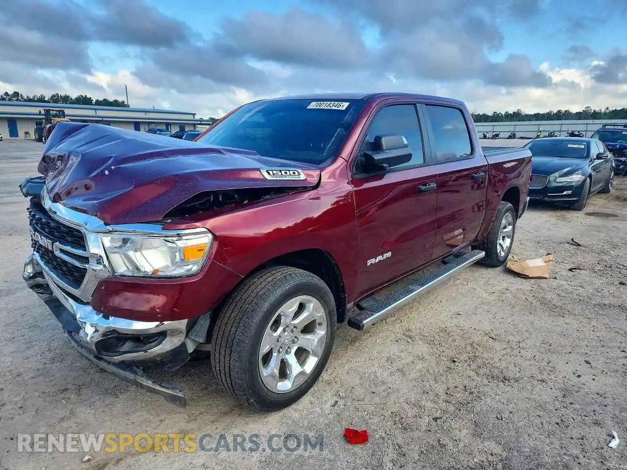 1 Photograph of a damaged car 1C6SRFFT6PN685922 RAM 1500 2023
