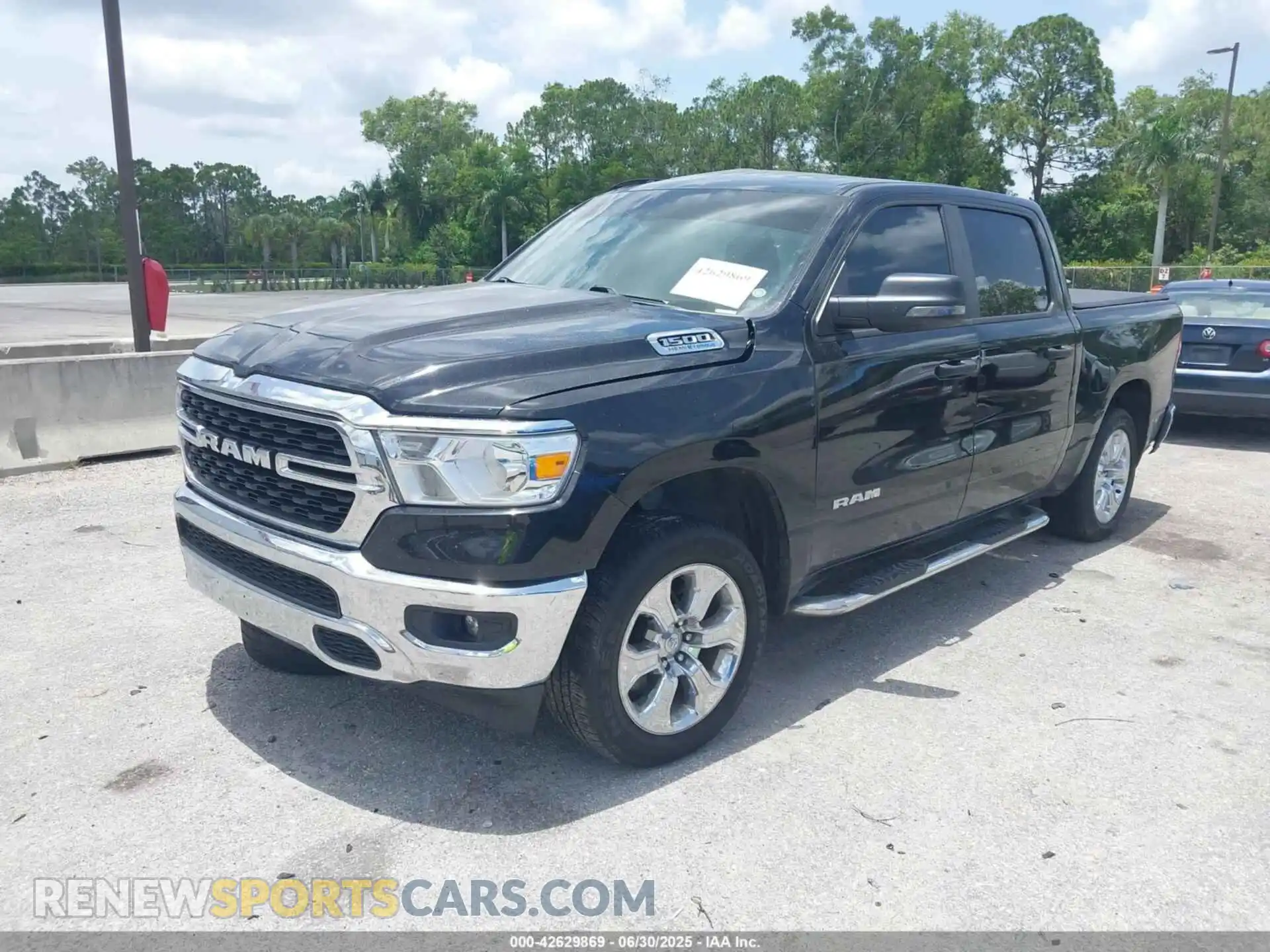 2 Photograph of a damaged car 1C6SRFFT7PN696492 RAM 1500 2023