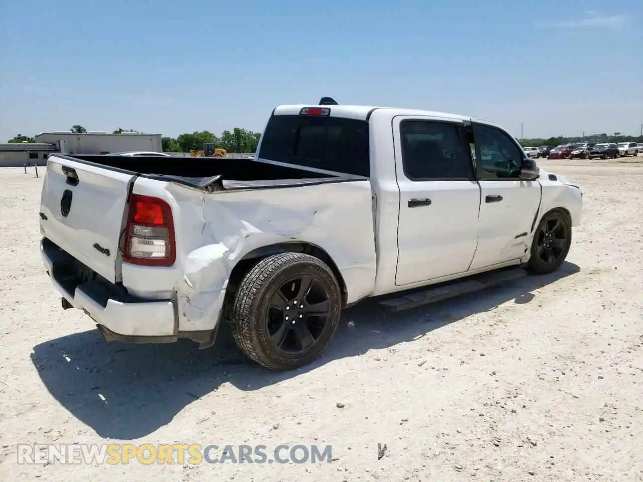 3 Photograph of a damaged car 1C6SRFFT7PN698730 RAM 1500 2023