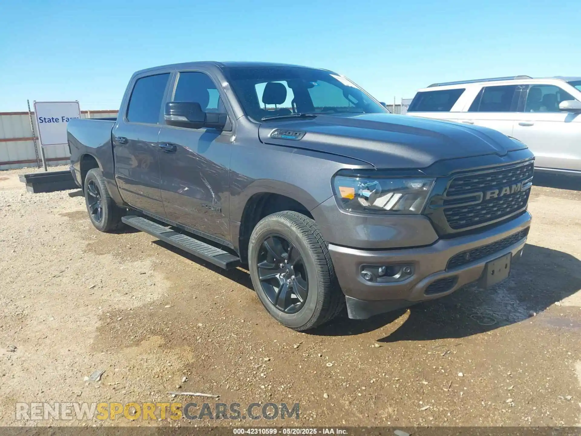 1 Photograph of a damaged car 1C6SRFFT8PN563045 RAM 1500 2023