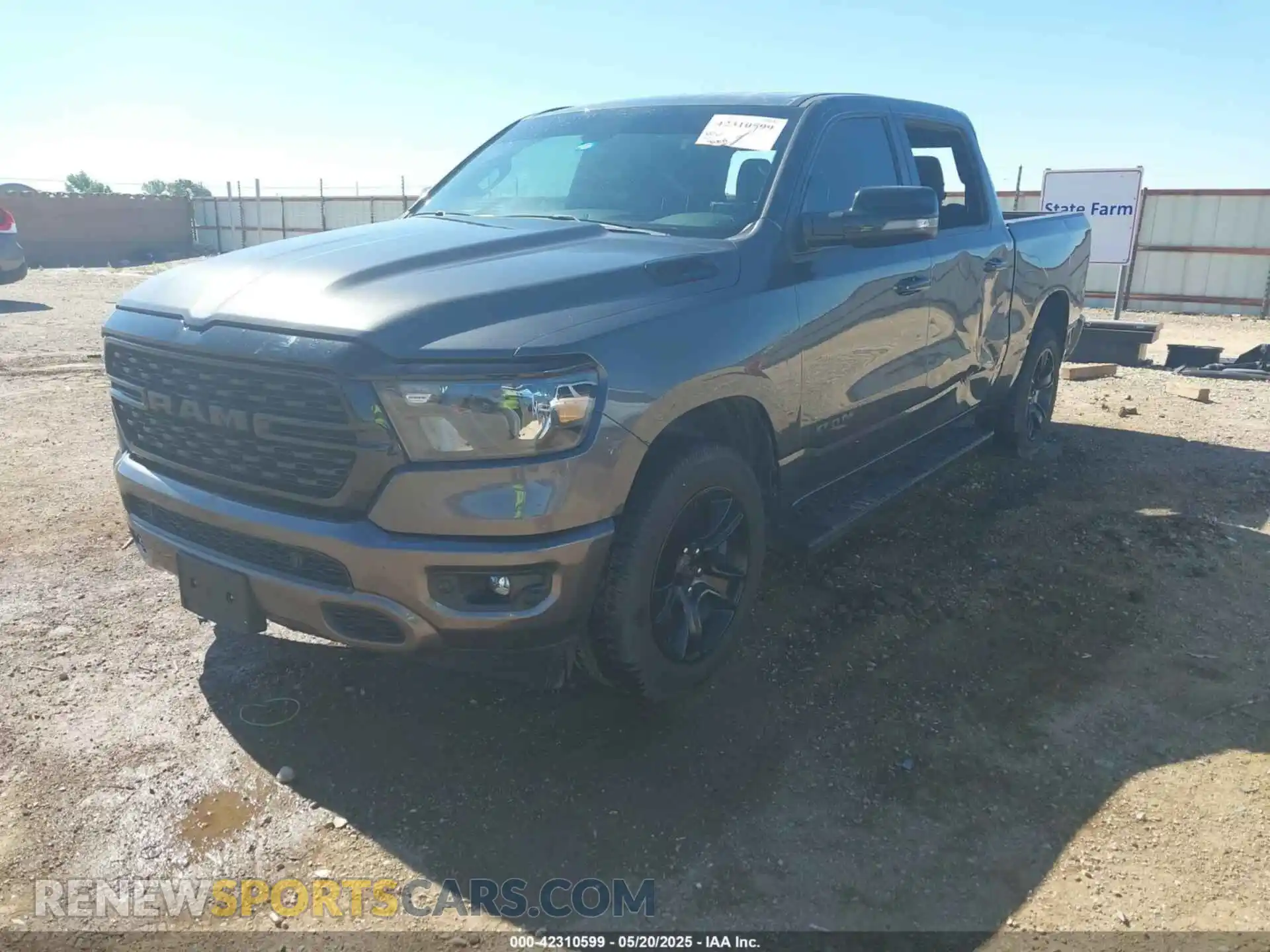 2 Photograph of a damaged car 1C6SRFFT8PN563045 RAM 1500 2023