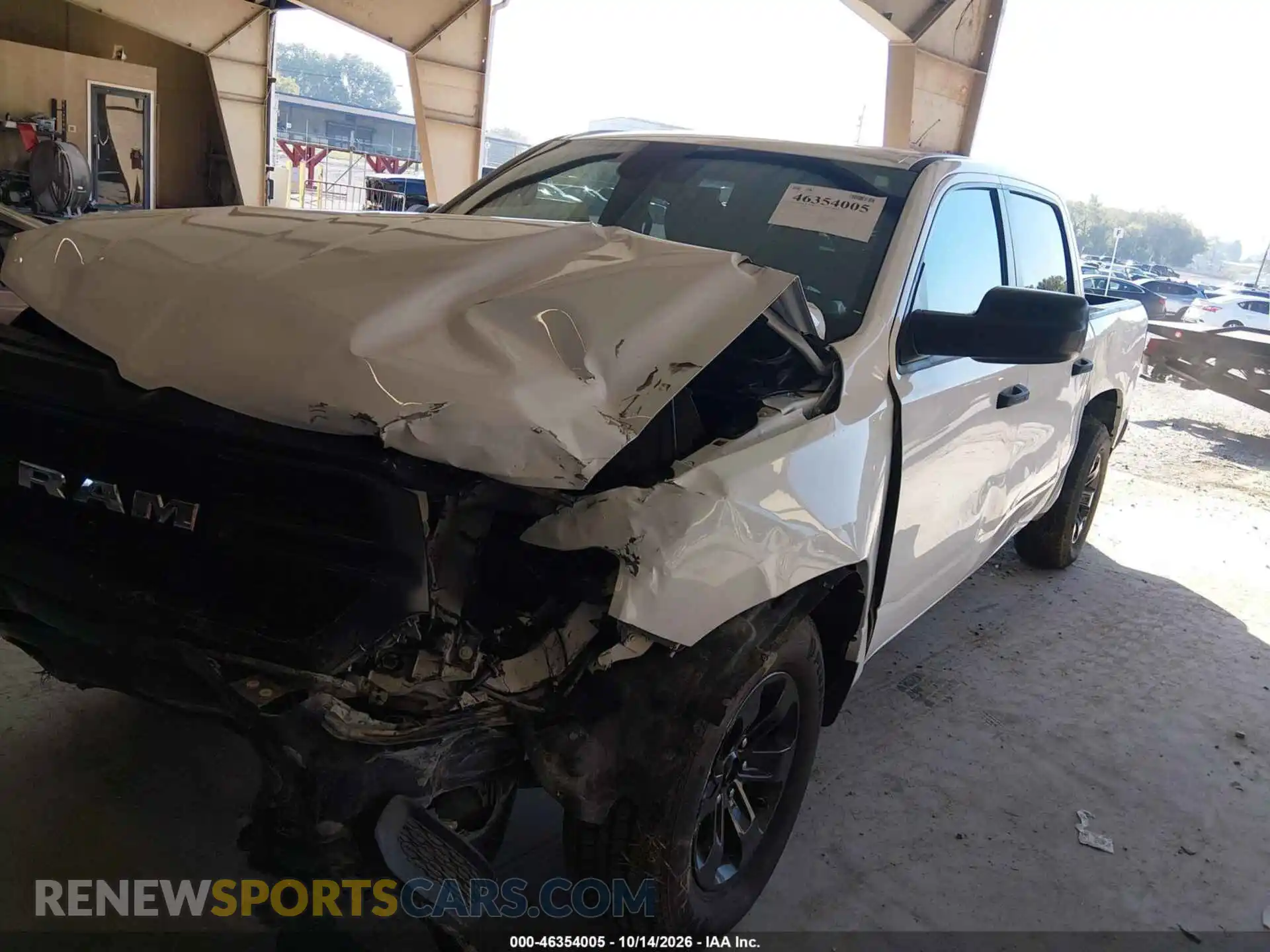 2 Photograph of a damaged car 1C6SRFGT9PN560587 RAM 1500 2023