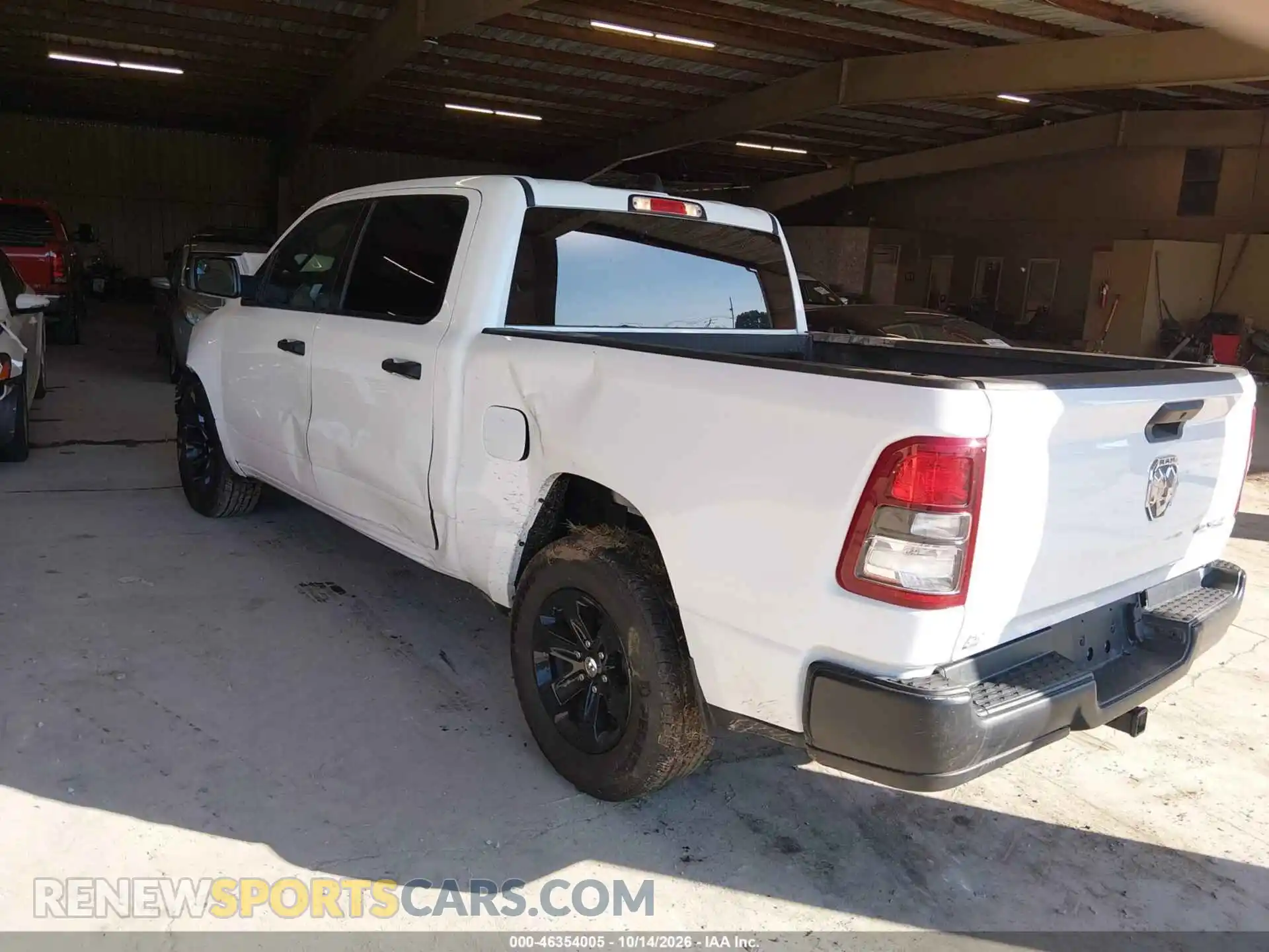 3 Photograph of a damaged car 1C6SRFGT9PN560587 RAM 1500 2023