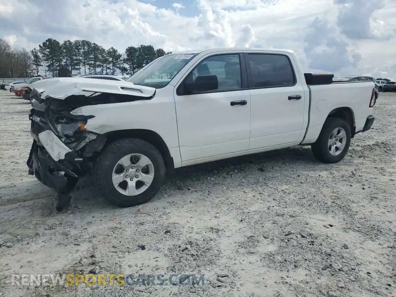 1 Photograph of a damaged car 1C6SRFGTXPN537285 RAM 1500 2023