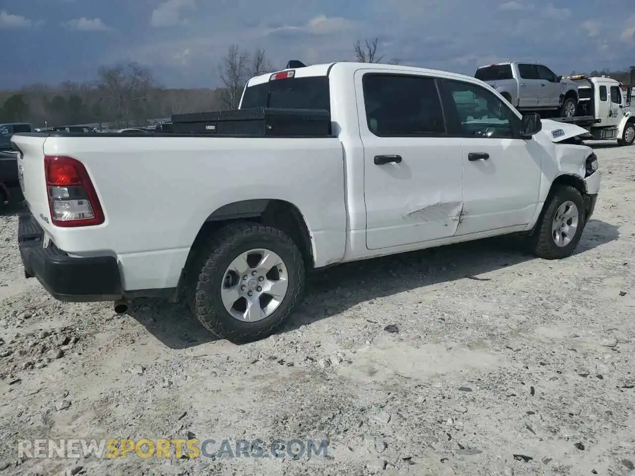 3 Photograph of a damaged car 1C6SRFGTXPN537285 RAM 1500 2023