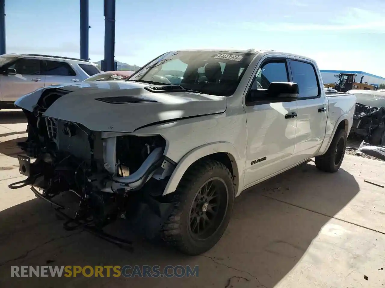 1 Photograph of a damaged car 1C6SRFHT0PN500597 RAM 1500 2023