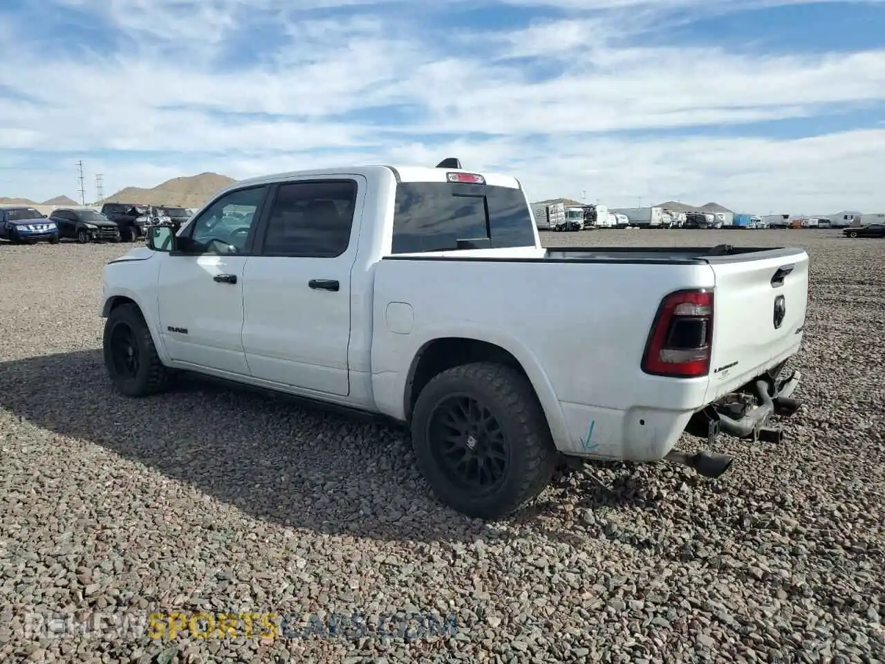 2 Photograph of a damaged car 1C6SRFHT0PN500597 RAM 1500 2023