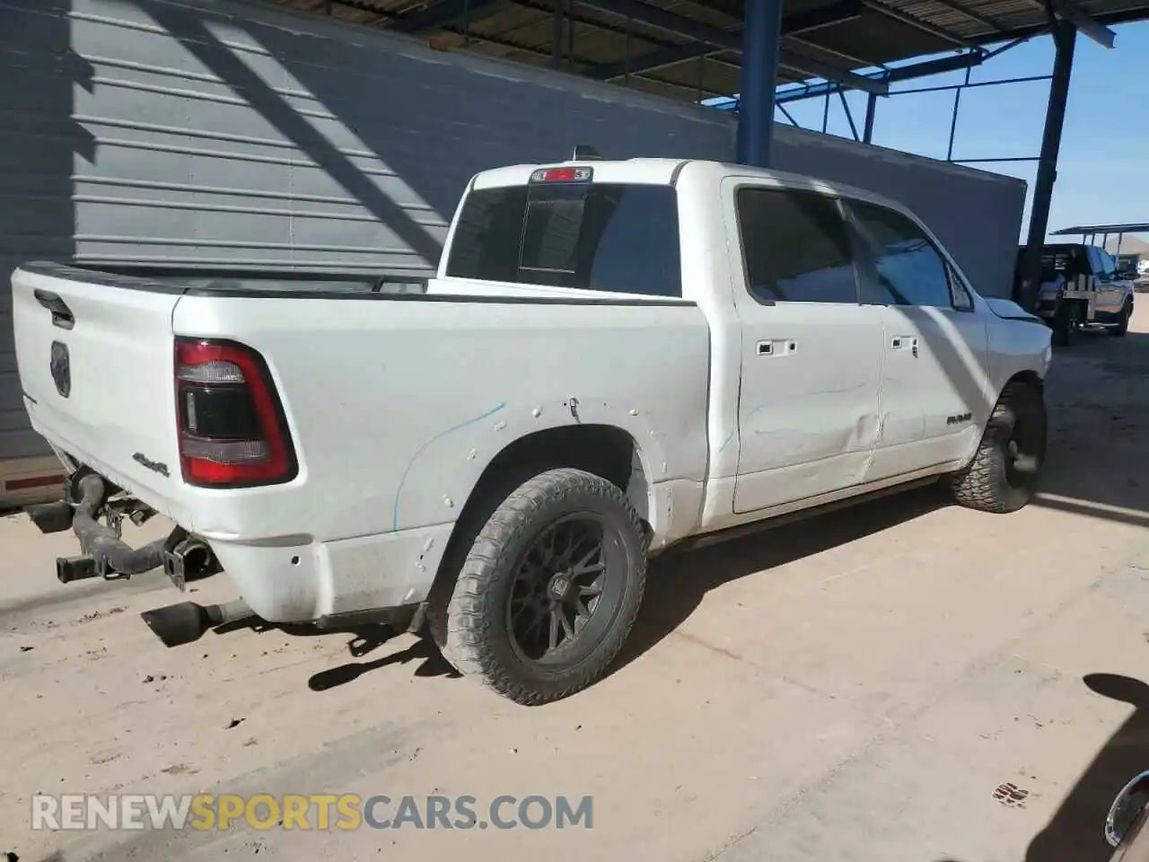 3 Photograph of a damaged car 1C6SRFHT0PN500597 RAM 1500 2023