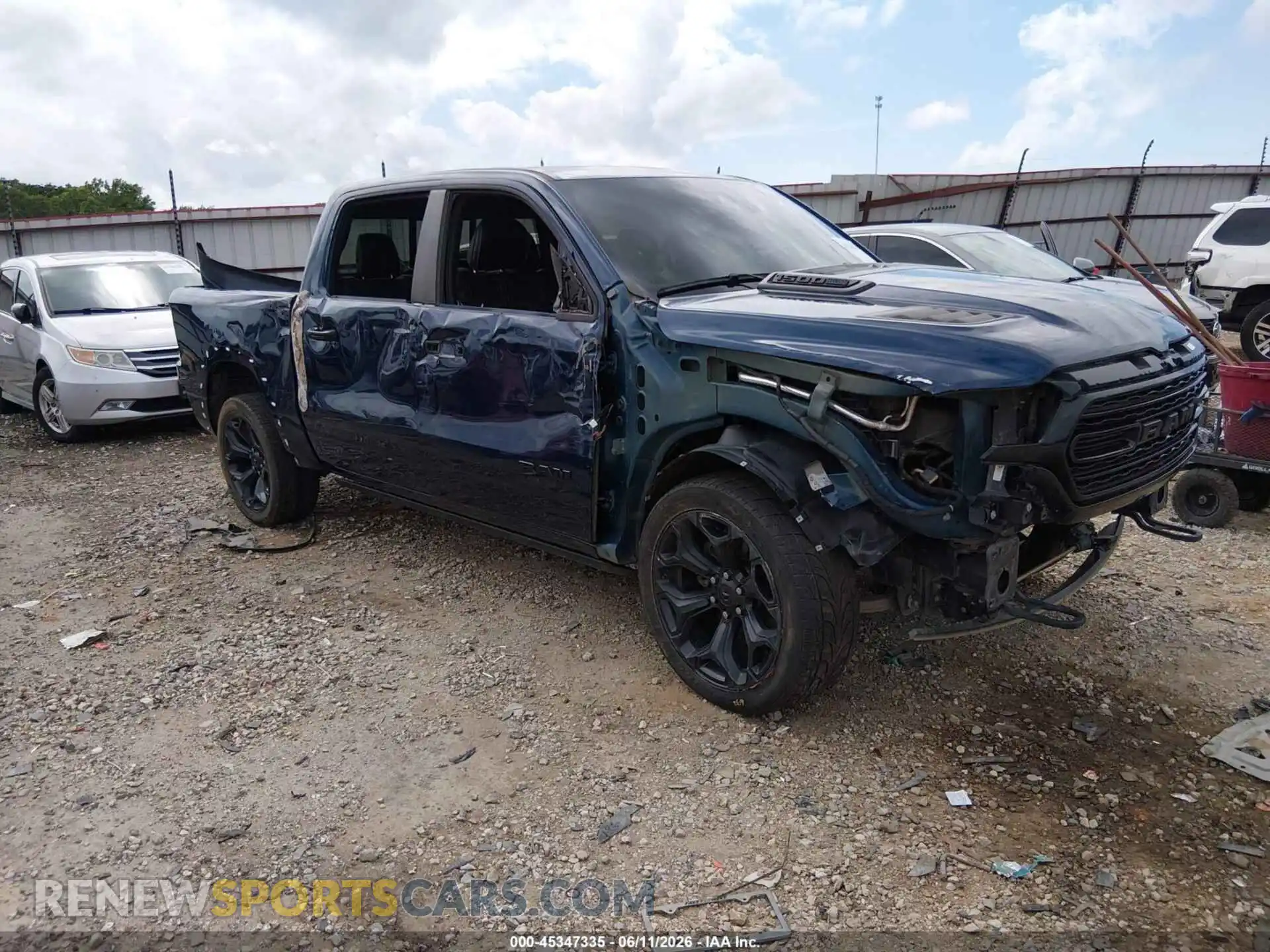 1 Photograph of a damaged car 1C6SRFHT0PN519683 RAM 1500 2023