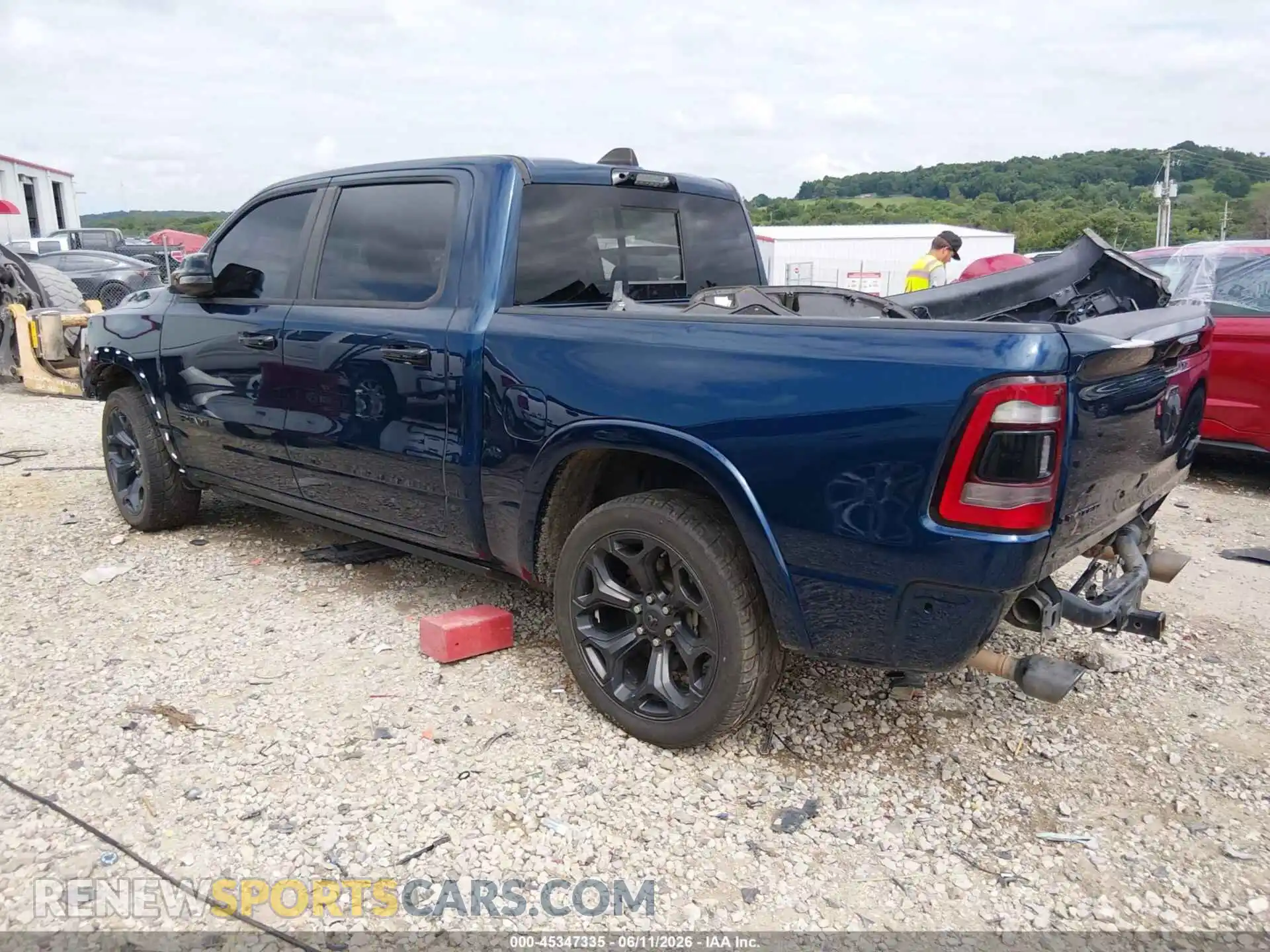 3 Photograph of a damaged car 1C6SRFHT0PN519683 RAM 1500 2023