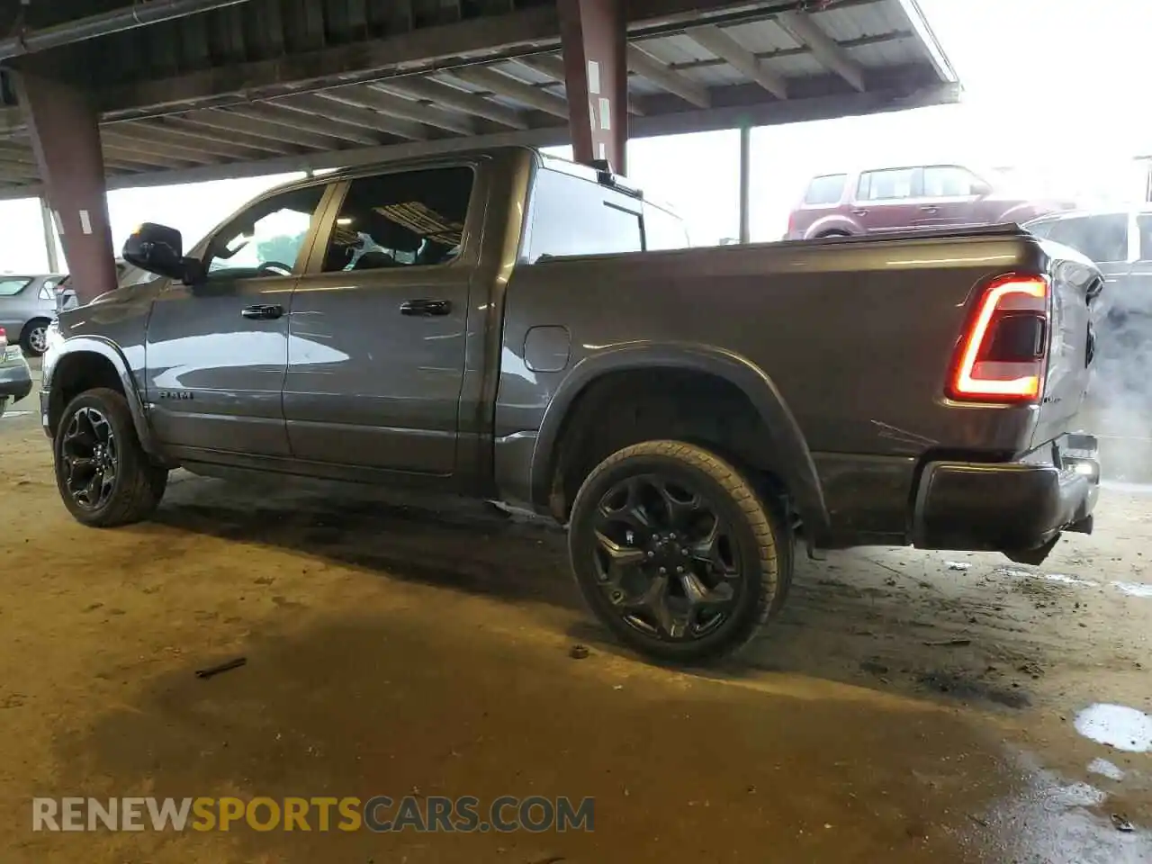 2 Photograph of a damaged car 1C6SRFHT3PN581322 RAM 1500 2023