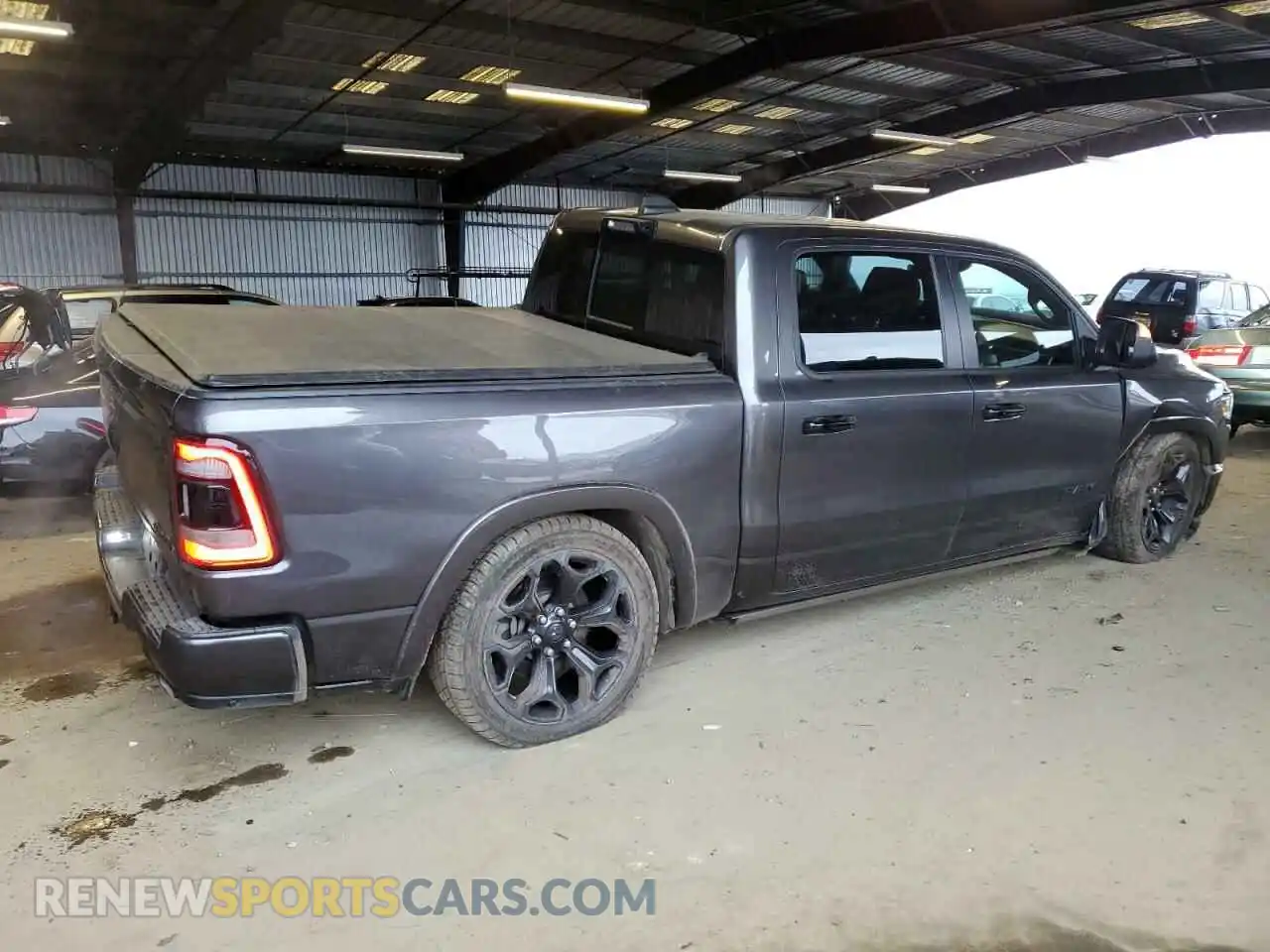 3 Photograph of a damaged car 1C6SRFHT3PN581322 RAM 1500 2023