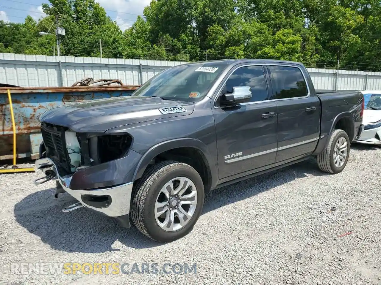 1 Photograph of a damaged car 1C6SRFHT5PN573495 RAM 1500 2023