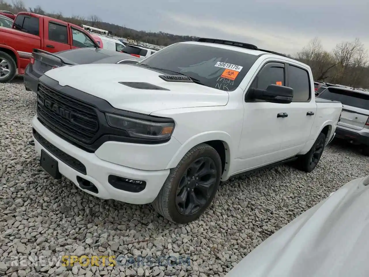 1 Photograph of a damaged car 1C6SRFHT6PN655767 RAM 1500 2023
