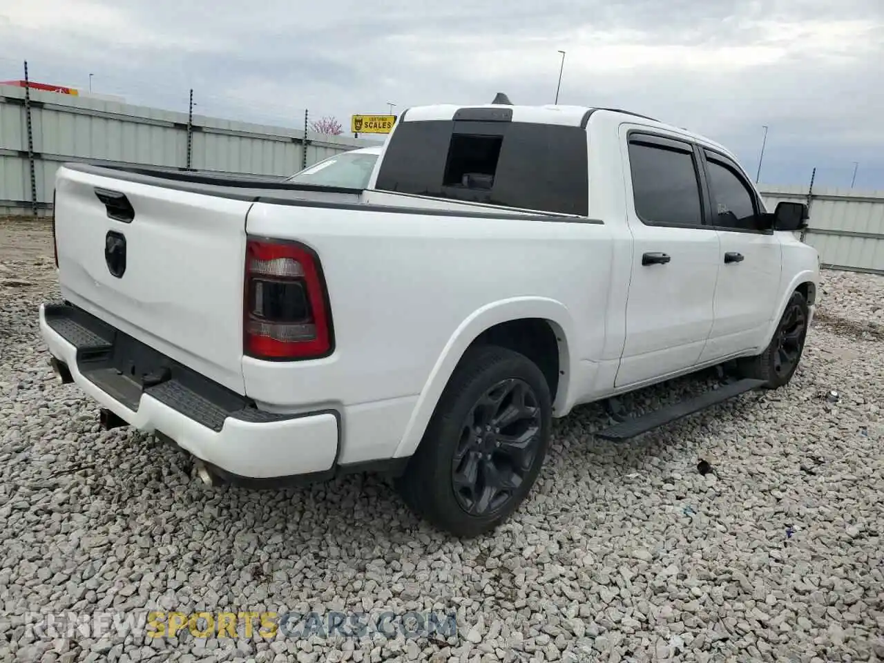 3 Photograph of a damaged car 1C6SRFHT6PN655767 RAM 1500 2023