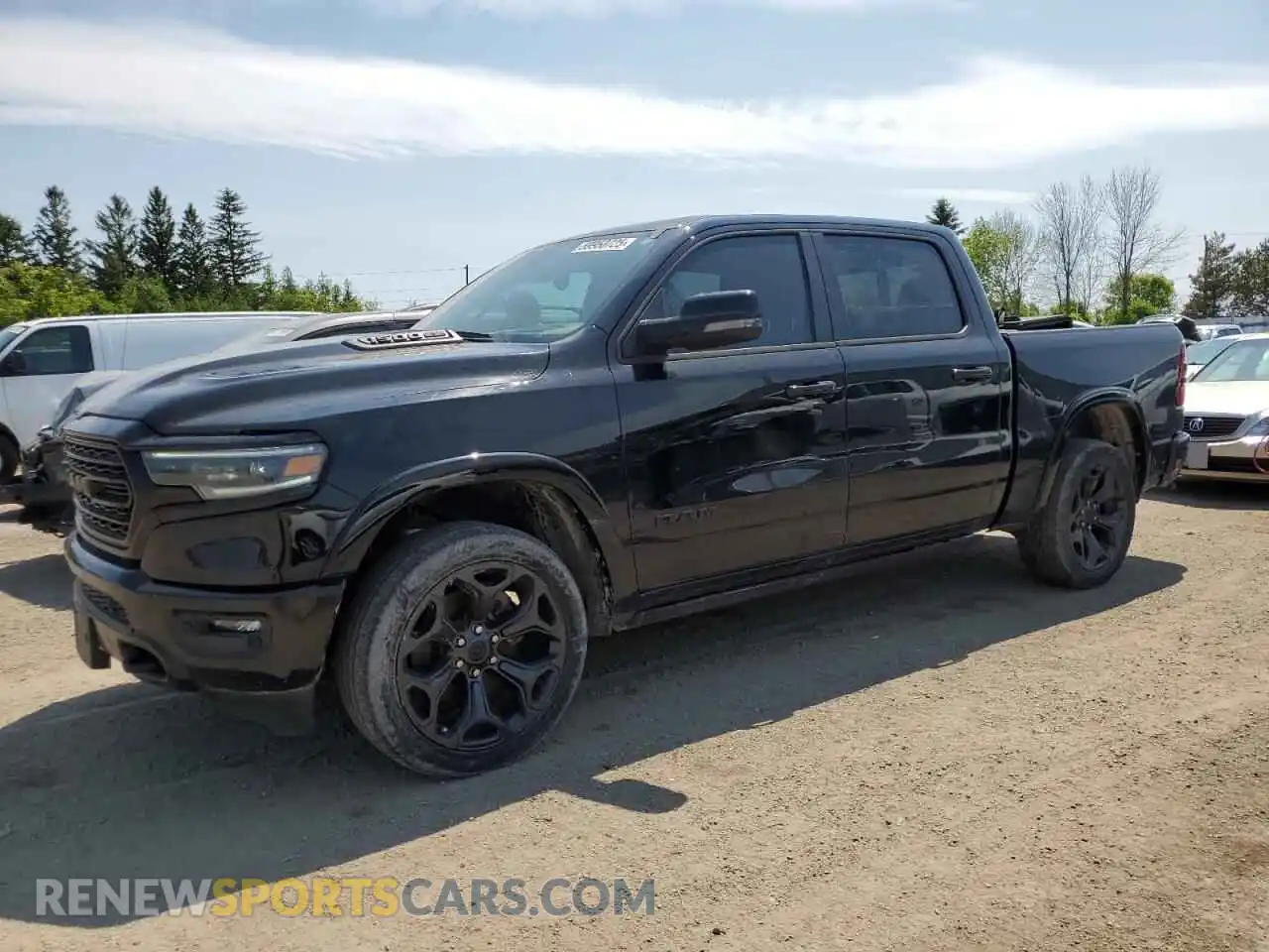 1 Photograph of a damaged car 1C6SRFHT7PN690835 RAM 1500 2023