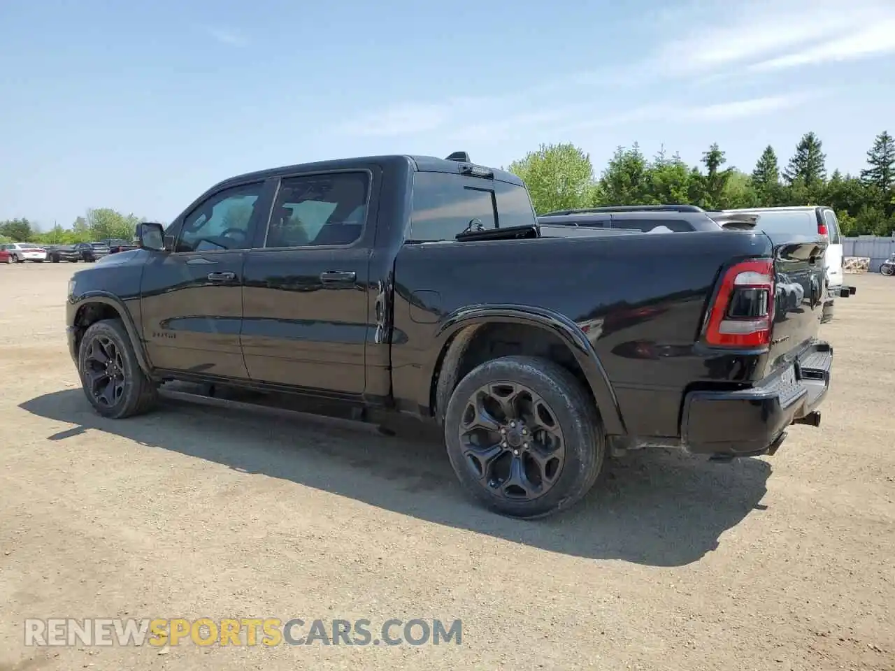 2 Photograph of a damaged car 1C6SRFHT7PN690835 RAM 1500 2023