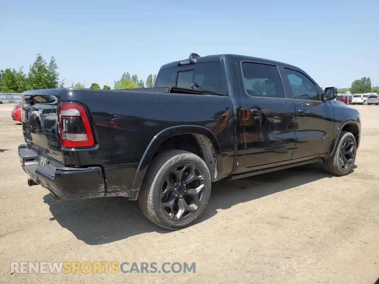 3 Photograph of a damaged car 1C6SRFHT7PN690835 RAM 1500 2023