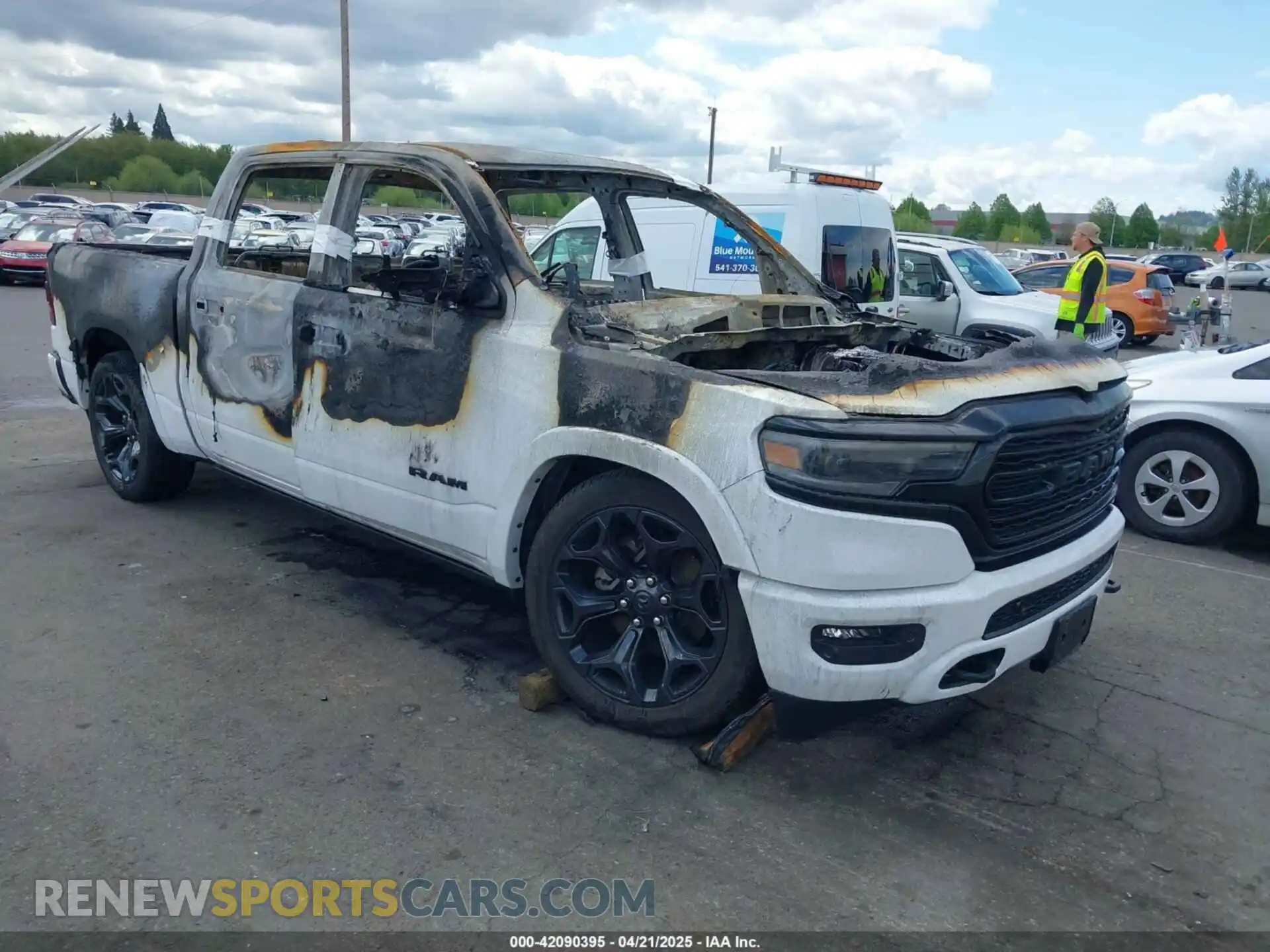 1 Photograph of a damaged car 1C6SRFHT9PN602190 RAM 1500 2023