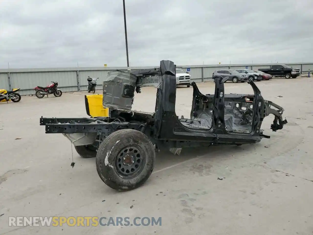 3 Photograph of a damaged car 1C6SRFJT0PN610687 RAM 1500 2023